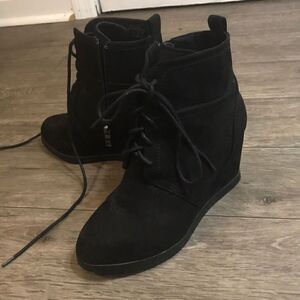 Black wedge booties, zip and tie